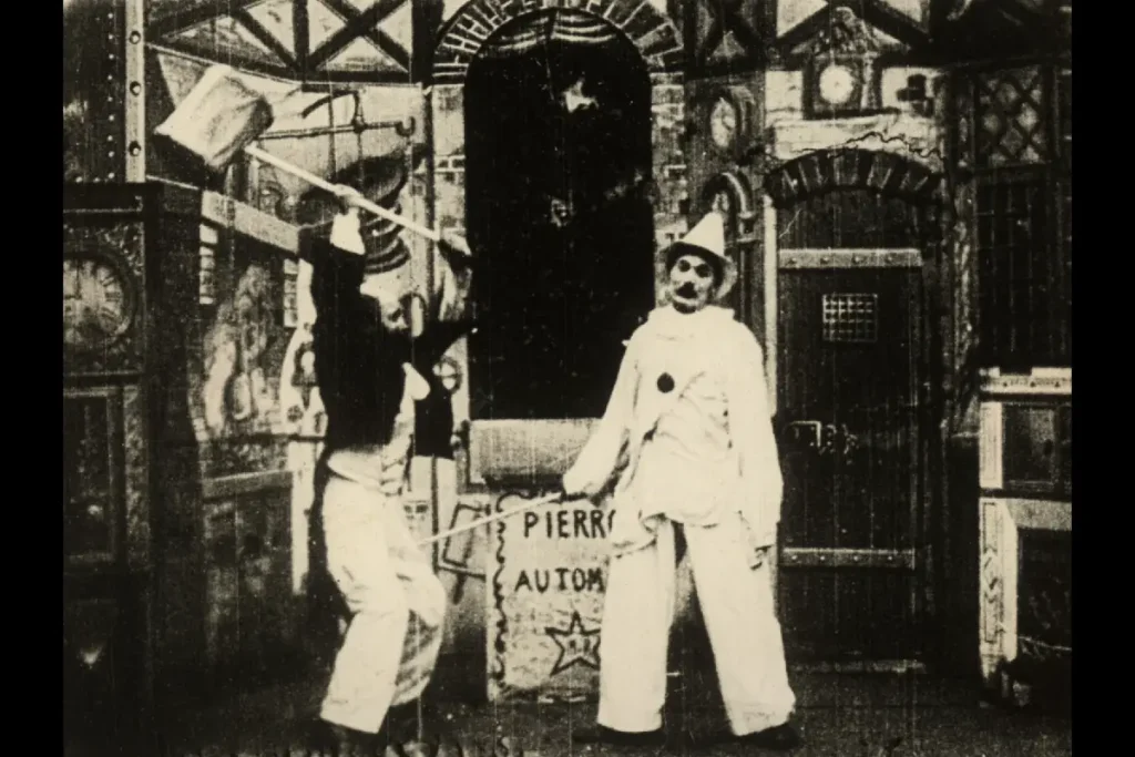 Méliès mit dem Pierrot-Automaten in „Gugusse et l’Automate“ von 1897